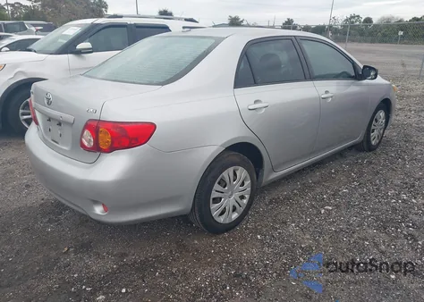 2009 Toyota Corolla Xle z USA, uszkodzony, nr VIN JTDBL40EX99060038